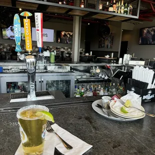 Sitting outside at the bar, watching the games!