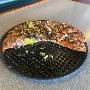 Half eaten perfect pizza