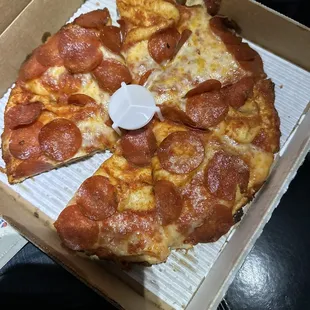Medium pizza with extra cheese and extra pepperoni supposedly.