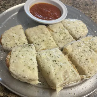 Their Garlic Bread / Garlic Cheese Bread!!! Omg I drooled all over it and still ate it all- goodness- it&apos;s 1am and I&apos;m crying
