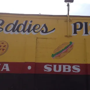 a sign on the side of a building