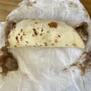 Carne Guisada Taco. Glad I asked if they we're big because they are. Homemade flour tortillas.