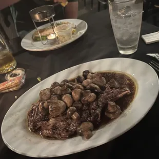 Bone-In Ribeye with mushrooms.