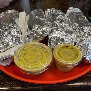 a plate of food with condiments