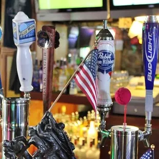 a bar with beer taps