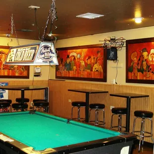 a pool table and bar