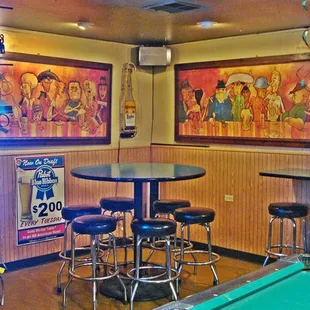 Murals in the back were commissioned by the original owner of actual customers that drank here in the 50s.