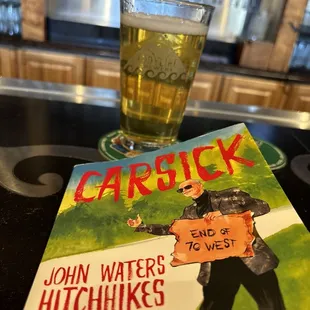 Beer and a book.