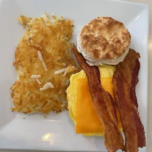 Biscuits and hashbrown. Scrambled eggs and bacon