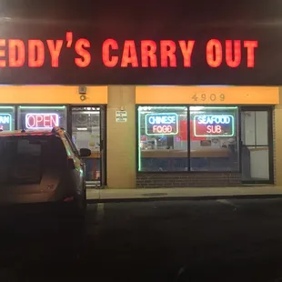 a car parked in front of the store