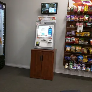 Just check your snacks out at the kiosk and enjoy your wait!