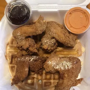Chicken and Waffles (syrup on the left and Eddy&apos;s sauce on the right)