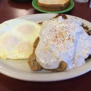 Country fried steak &amp; eggs over medium.