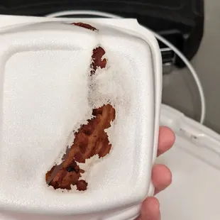 bacon in a styrofoam container