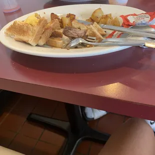 Our medium steak and soggy home fries
