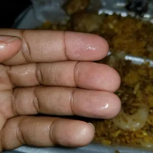 Grease on my fingers from holding the spring rolls....