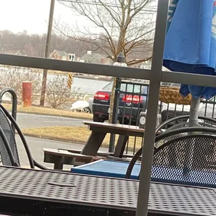 Outside patio area and a swan in the parking lot