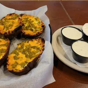 Potato skins with jalapenos instead of bacon bits. Ranch / sour cream on the side.