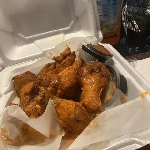 Wings, requested sauce on side they came with sauce. And they gave us all drum and no mix of flats and drums