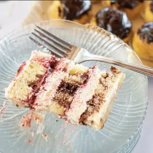 a slice of cake on a plate with a fork