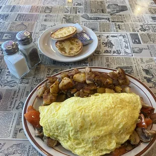 Avocado tomato cheddar green chili omelette