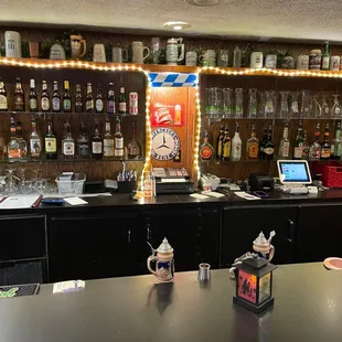 a bar with a lot of bottles