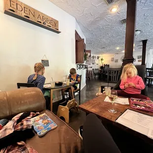 children sitting at tables