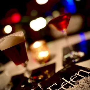 two glasses of wine and a book