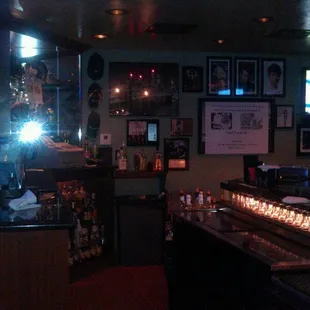 a bar with candles lit up