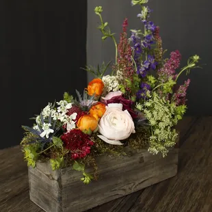 Signature Eden Floral boxed arrangement of funky premium flowers.