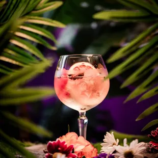 Seven Deadly Sins -- Vodka, Rum, Mezcal, Gin, Tequila, bourbon, Dry Curacao, Beat Root, Lemon, Ginger