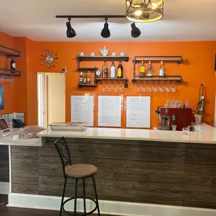 a bar with orange walls