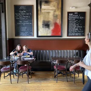 You can eat in the bar area, too.