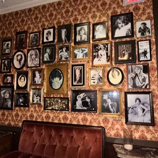 a wall full of family photos