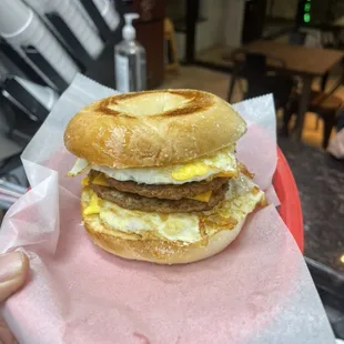 Sausage, egg cheese, sandwich on bagel.