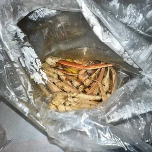 crab legs in a plastic bag
