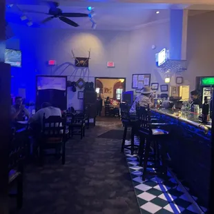 Inside Bar where live music plays and there is a TV