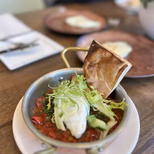 a bowl of food on a table