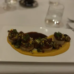 Scallop special- seared scallops, butternut squash purée, shallots and garlic with a balsamic reduction, I think, it's been a minute