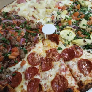 pepperoni, artichoke, and other toppings