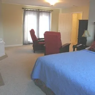 The upstairs master suite has a large jetted tub, recliners, and a private balcony.
