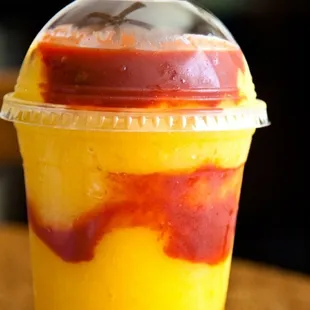 Mangonada! Mango sorbet topped with Chamoy &amp; Tajin