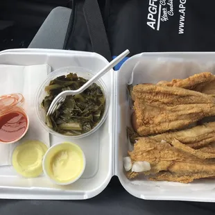 Lake trout side of greens. Yellow tartar sauce (has mustard) and hot sauce