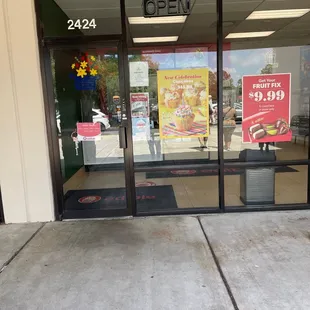 the front door of a convenience store