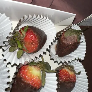 bruises are one thing. but there is something off with almost all of these strawberries. besides the obvious mold