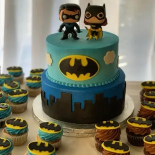 a cake with batman and robin on top