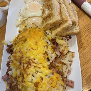 Stuffed hash browns!  With 2 eggs and sour dough bread!