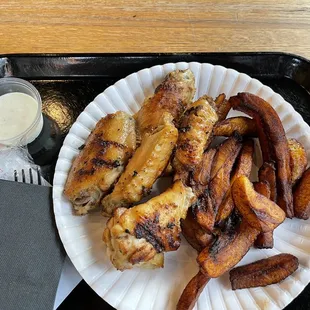 Wings and Dodo (Plantains)was delicious!! Seasoned well and cooked perfectly!