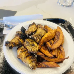 Chicken wings and dodo fries.. SO GOOD!!