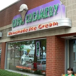 two women sitting on a bench